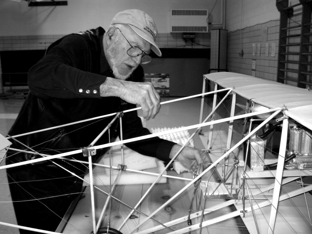Archie Henkelmann Assembles Model in Beloit by Rose Dorcey