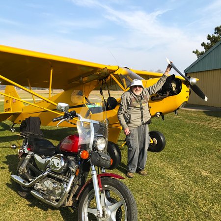 Archie Henkelmann with Cub and Motorcycle