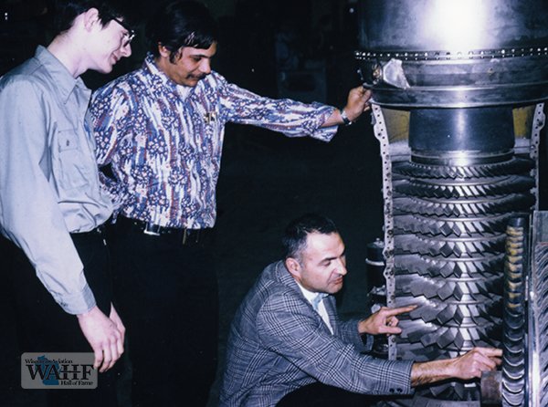 Archie explaining jet engine details to students date unknown