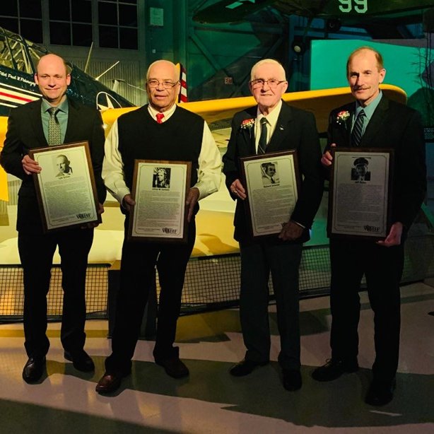 Inductee group, Dave Cabelka for Lyle Grimm, Norman Florence for Alfred Gorham, Richard Schmidt, and Jeff Skiles